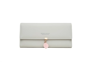 Detail view of grey long leather wallet featuring rose gold leaf pendant and logo