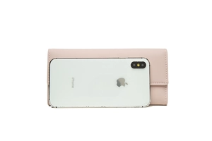 Pink long flap wallet for women showing size comparison with a smartphone