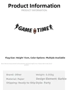 Detail view of paper Game Time banner with football silhouettes for party decoration