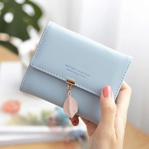 Light blue tri-fold women's leather wallet with pink leaf pendant and gold hardware