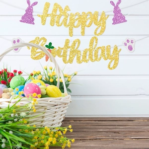 Glittery gold Happy Birthday banner with purple rabbit and footprints for Easter parties