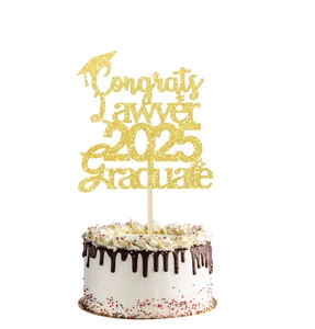 Detail of glitter gold Congrats Lawyer 2025 cake topper with mortarboard on chocolate cake