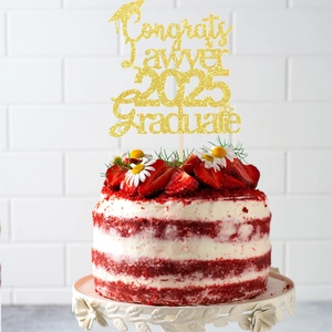 Gold glitter Congrats Lawyer 2025 cake topper with graduation cap on red velvet cake