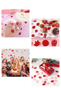 Dettagli di coriandoli a fragola rossi per decorazioni tavola e confezioni