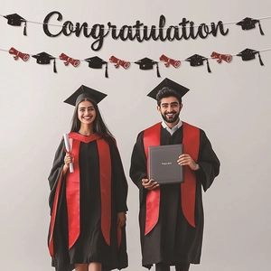 Congratulations banner with black glitter letters and graduation cap bunting for party decor