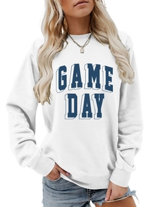 Close-up of Game Day 3D lettering on white crewneck sweatshirt and blue pendant