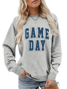 Detail of grey Game Day sweatshirt showing high-quality fabric texture and ribbed cuffs