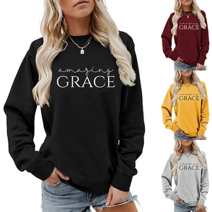 Detail view of Amazing Grace print sweatshirt in black, burgundy, yellow and grey
