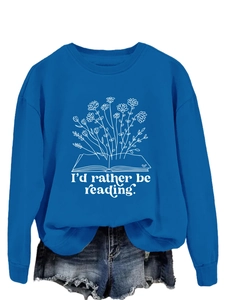 Detail of floral book graphic and I'd rather be reading slogan on blue sweatshirt