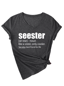 Detail of V-neck grey tee with rolled sleeves, side knot, and white seester print