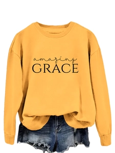 Detail of Mustard Yellow Amazing Grace sweatshirt showing high-quality cotton fabric
