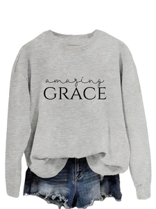 Detail of grey amazing grace sweatshirt featuring premium fleece fabric and screen print