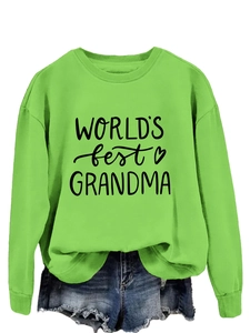 Detail of ribbed neckline and World's Best Grandma print on bright green sweatshirt