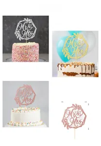 Detailed view of Mr & Mrs glitter cake toppers in gold silver and rose gold colors