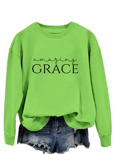 Detail of lime green amazing grace sweatshirt with ribbed crewneck and print