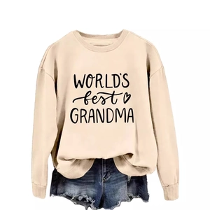 Casual long sleeve beige sweatshirt with World's Best Grandma print and denim shorts