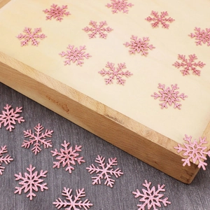 Pink glitter snowflake confetti ornaments for Christmas table decor and party favors