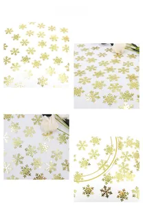 Detailed view of golden snowflake sequins for festive Christmas party table decorations