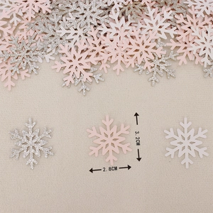 Christmas snowflake confetti set in pink and white glitter colors for party decor