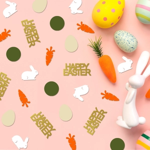 Easter confetti set with glittery Happy Easter letters, bunnies, and carrots for table decor