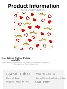 Detailed view of red hearts and gold crowns paper confetti for wedding and party decor