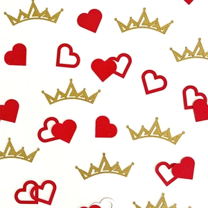 Mix of gold glitter crowns and red paper hearts for wedding and party decorations