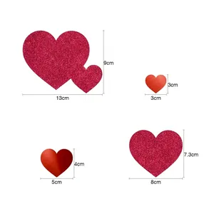 Size guide for heart paper garlands featuring glitter pink and metallic red heart shapes