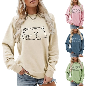 Detail of ribbed neckline and cute pig print on a women's round neck sweatshirt