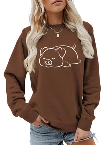 Detailed view of coffee brown sweatshirt with cute white pig graphic and ribbed cuffs