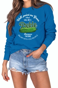 Detail of blue crewneck sweatshirt with green pickle print and humorous quote