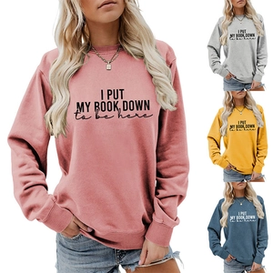 Detail showing various colors and slogan print for this casual long sleeve sweatshirt