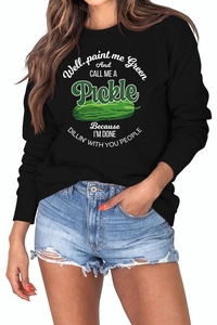 Detail of loose black sweatshirt with green pickle print and humorous text for women