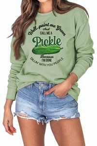 Detail of light green sweatshirt featuring 'Pickle' graphic print and funny quote text