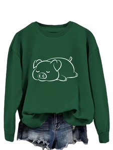 Detail of dark green crewneck sweatshirt featuring a minimalist white pig print and ribbed cuffs