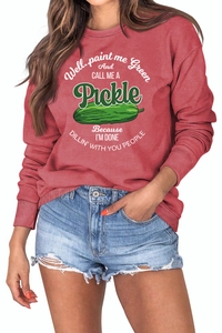 Detail of round neck brick red sweatshirt with funny green pickle graphic print