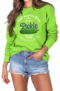 Close-up of green crewneck sweatshirt featuring white and dark green pickle graphic print