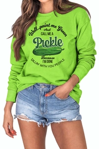 Macro detail of ribbed cuffs and high-saturation neon green fabric on a casual sweatshirt