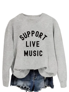 Detail of grey sweatshirt showing Support Live Music print and cotton fabric texture