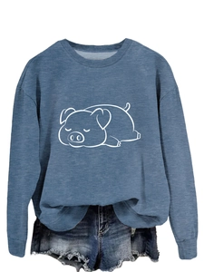 Close-up of casual steel blue sweatshirt featuring a cute cartoon pig line art print