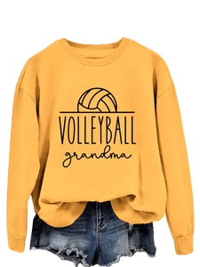 Detail of Volleyball Grandma graphic print on mustard yellow crewneck sweatshirt