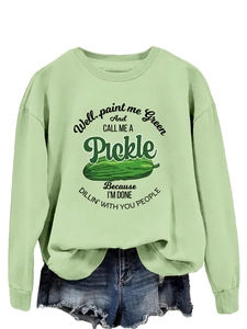 Detail of light green sweatshirt with pickle graphic and humorous typography print