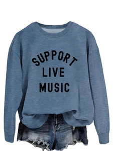 Detail of ribbed cuffs and SUPPORT LIVE MUSIC print on blue long sleeve sweatshirt