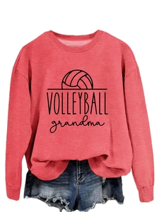 Close-up of Volleyball Grandma graphic print on coral pink long sleeve sweatshirt