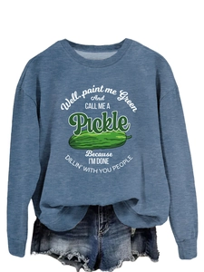 Detail of blue-grey crewneck sweatshirt with humorous pickle print and graphic text