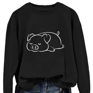 Women's black crewneck sweatshirt featuring a cute sleeping pig graphic print and long sleeves