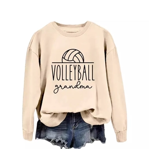 Women's crewneck sweatshirt with Volleyball Grandma print paired with denim shorts