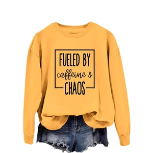 Yellow crewneck sweatshirt featuring Caffeine & Chaos print with denim shorts set