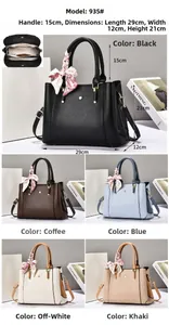 Detailed internal compartments and size dimensions for this multi-color women's handbag
