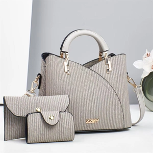 Three-piece set of beige striped tote bag with matching crossbody bag and a wallet