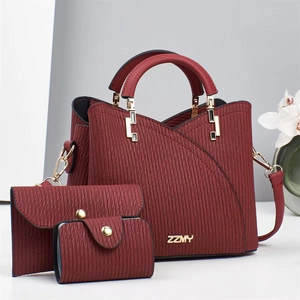 Three-piece set of burgundy tote bag with vertical pleated texture and matching pouches
